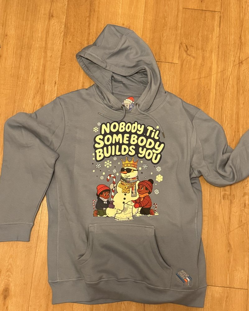 Nobody Til Somebody Builds You hoodie in slate blue, laid flat