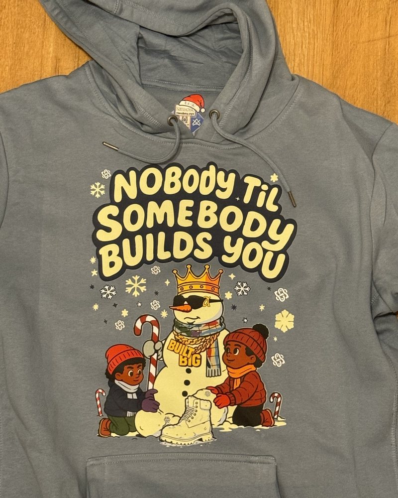 Front print close-up: snowman graphic with Nobody Til Somebody Builds You lettering