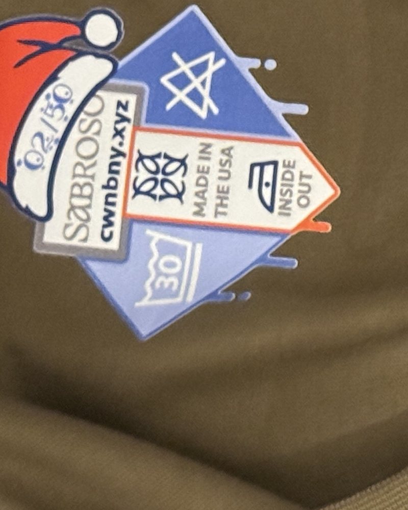 Printed neck label with care symbols and piece number